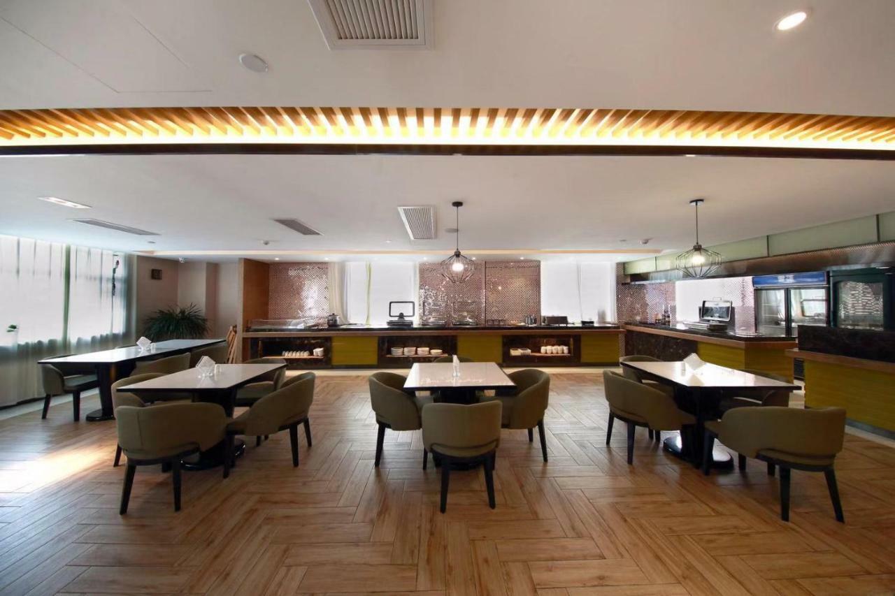 เมโทรโปโล ไหโข่ว อู๋จื่อซาน ฮ็อตสปริง โฮเทล Hotel ไหโขว่ ภายนอก รูปภาพ